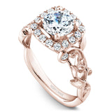 A Noam Carver rose gold engagement ring with a cushion halo, 18 round diamonds and a detailed floral band. 