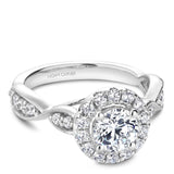 A Noam Carver white gold engagement ring with a floral halo and 26 diamonds.