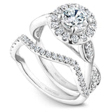 A Noam Carver white gold engagement ring with a floral halo and 26 diamonds.