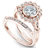 A Noam Carver rose gold engagement ring with 18 round diamonds on a floral halo and a detailed band.