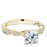 A Noam Carver yellow gold engagement ring with a round centerpiece and a floral band dazzled with 18 diamonds.