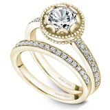 A Noam Carver yellow gold engagement ring with a floral setting and 18 round diamonds.