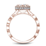 A Noam Carver rose gold engagement ring with a floral setting and 52 round diamonds.