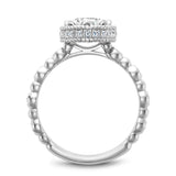 A Noam Carver white gold engagement ring with a floral setting, a detailed band and 28 round diamonds.