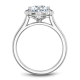A Noam Carver white gold engagement ring with 16 round diamonds on a floral halo.
