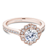 A Noam Carver rose gold engagement ring with a floral halo and 36 diamonds.