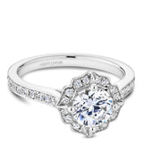 A Noam Carver white gold engagement ring with a floral halo and 36 diamonds.