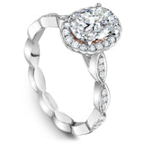 A Noam Carver white gold engagement ring with an oval centerpiece  and 36 diamonds.