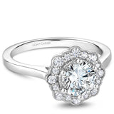 A Noam Carver white gold engagement ring with a floral halo and 16 diamonds.