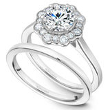 A Noam Carver white gold engagement ring with a floral halo and 16 diamonds.