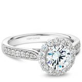 A Noam Carver white gold engagement ring with a floral halo and 30 diamonds.