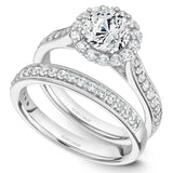 A Noam Carver white gold engagement ring with a floral halo and 30 diamonds.