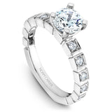 A Noam Carver white gold engagement ring with 12 diamonds.