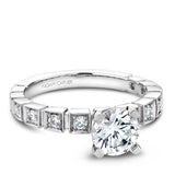 A Noam Carver white gold engagement ring with 12 diamonds.