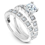 A Noam Carver white gold engagement ring with 12 diamonds.