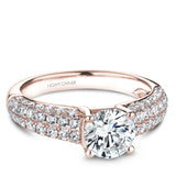 A Noam Carver rose gold engagement ring with 52 diamonds.