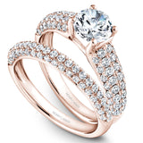 A Noam Carver rose gold engagement ring with 52 diamonds.