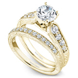 A Noam Carver yellow gold engagement ring with 8 diamonds.