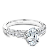 A Noam Carver white gold engagement ring with an oval centerpiece and 66 diamonds.