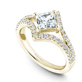 A Noam Carver yellow gold engagement ring with 46 diamonds.