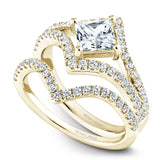 A Noam Carver yellow gold engagement ring with 46 diamonds.