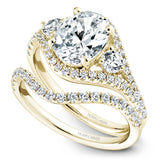A Noam Carver yellow gold engagement ring with 44 diamonds.