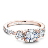 A Noam Carver rose gold engagement ring with 16 diamonds.