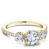 A Noam Carver yellow gold engagement ring with 16 diamonds.