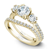 A Noam Carver yellow gold engagement ring with 16 diamonds.