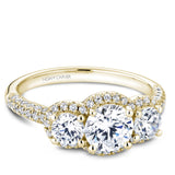 A Noam Carver yellow gold engagement ring with 100 diamonds.