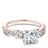 A Noam Carver rose gold engagement ring with 14 diamonds.