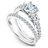 A Noam Carver white gold engagement ring with 14 diamonds.