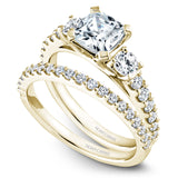 A Noam Carver yellow gold engagement ring with 14 diamonds.