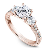 A Noam Carver rose gold engagement ring with 12 diamonds.