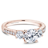 A Noam Carver rose gold engagement ring with 12 diamonds.
