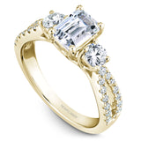 A Noam Carver yellow gold engagement ring with 28 diamonds.
