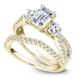 A Noam Carver yellow gold engagement ring with 28 diamonds.
