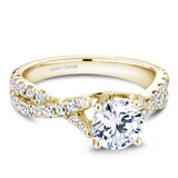 A Noam Carver yellow gold engagement ring with a twist band and 32 round diamonds.