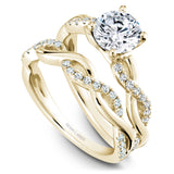A Noam Carver white gold engagement ring with a twist band and 24 round diamonds.