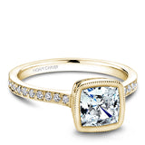 A Noam Carver yellow gold engagement ring with 40 diamonds.