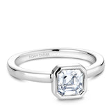 A Noam Carver white gold engagement ring with an asscher cut solitaire diamond.
