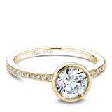 A Noam Carver yellow gold engagement ring with 28 round diamonds.