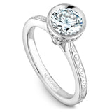 A Noam Carver engraved white gold engagement ring with 25 diamonds.