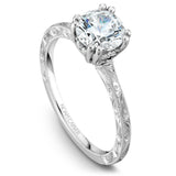 A Noam Carver engraved white gold engagement ring with 8 round diamonds.