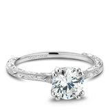 A Noam Carver engraved white gold engagement ring with 8 round diamonds.