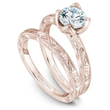 A Noam Carver engraved rose gold engagement ring with a round center diamond.