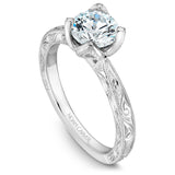 A Noam Carver engraved white gold engagement ring with a round center diamond.