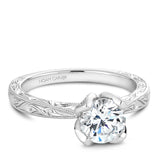 A Noam Carver engraved white gold engagement ring with a round center diamond.