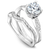 A Noam Carver white gold engagement ring with 12 diamonds.