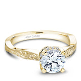 A Noam Carver yellow gold engagement ring with 12 diamonds.